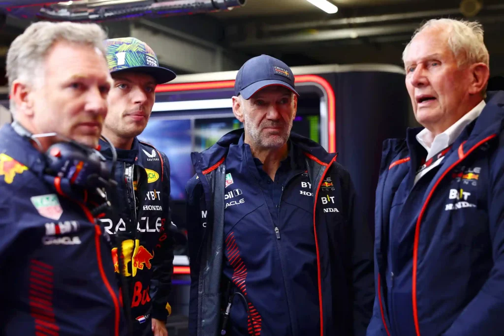 ZANDVOORT, NETHERLANDS - AUGUST 27: Red Bull Racing Team Principal Christian Horner, Max Verstappen of the Netherlands and Oracle Red Bull Racing, Adrian Newey, the Chief Technical Officer of Red Bull Racing and Red Bull Racing Team Consultant Dr Helmut Marko look on in the garage during a red flag delay during the F1 Grand Prix of The Netherlands at Circuit Zandvoort on August 27, 2023 in Zandvoort, Netherlands.