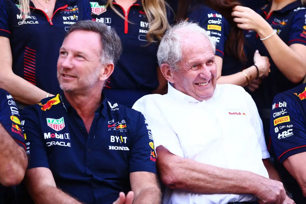 ABU DHABI, UNITED ARAB EMIRATES - NOVEMBER 26: Red Bull Racing Team Principal Christian Horner and Red Bull Racing Team Consultant Dr Helmut Marko pose at the Red Bull Racing Team Photo prior to the F1 Grand Prix of Abu Dhabi at Yas Marina Circuit on November 26, 2023 in Abu Dhabi, United Arab Emirates