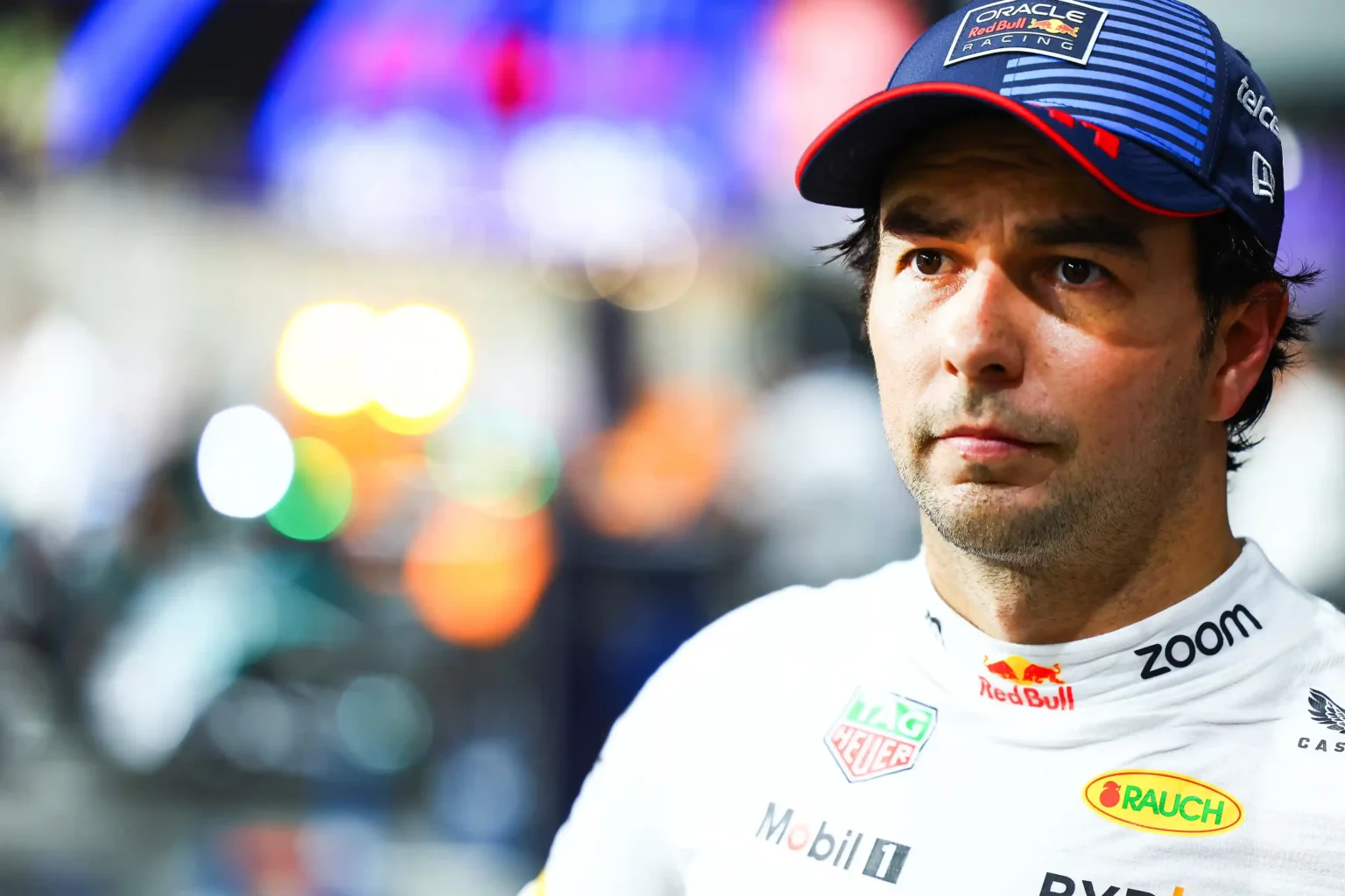 JEDDAH, SAUDI ARABIA - MARCH 08: Third placed qualifier Sergio Perez of Mexico and Oracle Red Bull Racing looks on in parc ferme during qualifying ahead of the F1 Grand Prix of Saudi Arabia at Jeddah Corniche Circuit on March 08, 2024 in Jeddah, Saudi Arabia. (Photo by Mark Thompson/Getty Images)