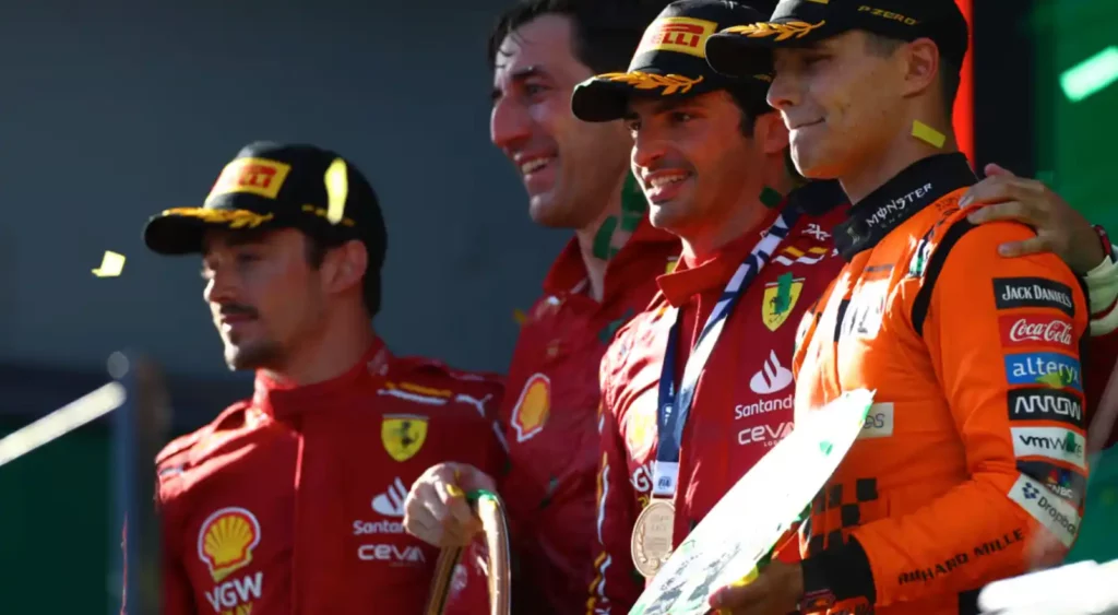 Race winner Carlos Sainz of Spain and Ferrari, Second placed Charles Leclerc of Monaco and Ferrari and Third placed Lando Norris of Great Britain and McLaren celebrate on the podium during the F1 Grand Prix of Australia at Albert Park Circuit on March 24, 2024 in Melbourne, Australia . (Photo by Peter Fox/Getty Images)