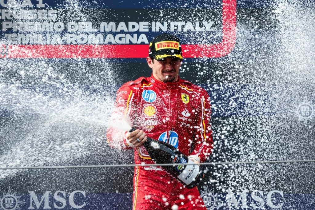 Leclerc festeggia sul podio a Imola