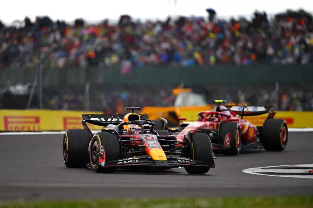 Max Verstappen of the Netherlands driving the (1) Oracle Red Bull Racing RB20 leads Carlos Sainz of Spain driving (55) the Ferrari SF-24 on track during the F1 Grand Prix of Great Britain at Silverstone Circuit on July 07, 2024 in Northampton, England. (Photo by Rudy Carezzevoli/Getty Images)