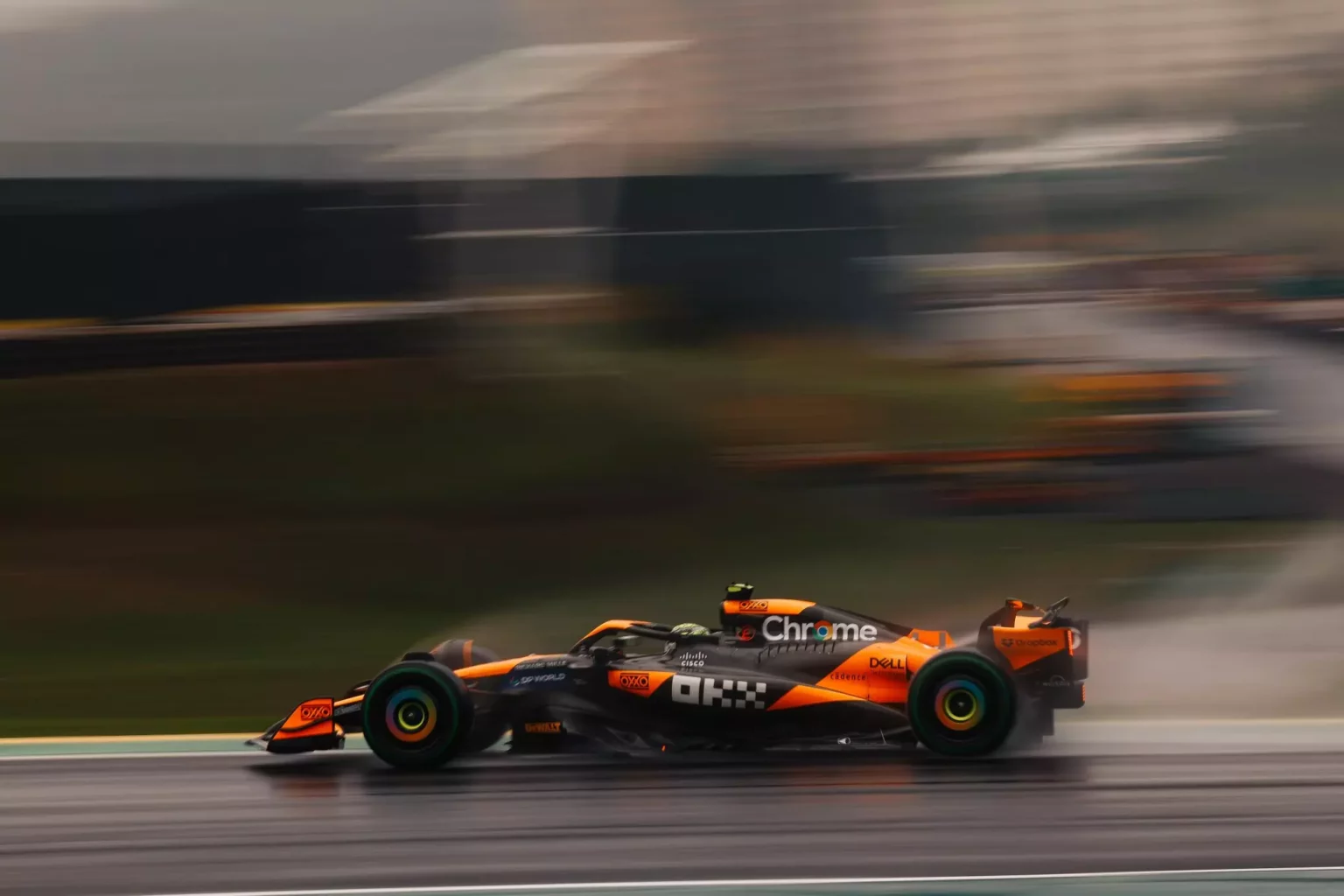 The McLaren car in action on the Interlagos circuit.